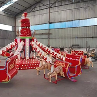 Manège unique sur le thème des luges de Noël, équipé de lumières LED, avec avion autoportant et manège rotatif