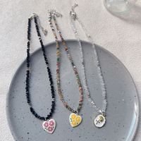 Cadeaux de fête des mères mode bijoux fins mer plage pierre naturelle pierre biliaire noire perlée en forme de coeur pendentif colliers pour femmes