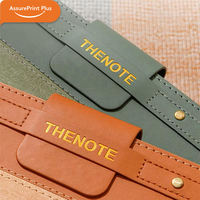 Carnet de notes A5 à couverture rigide en cuir PU PVC/papier bicolore avec rivets et fermoir à pression, logo personnalisé en relief, agenda de bureau
