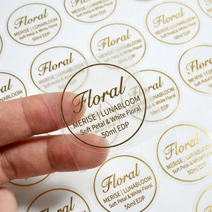 Etiquetas <span class=keywords><strong>Transparentes</strong></span> Redondas al por Mayor, <span class=keywords><strong>Personalizadas</strong></span>, Adhesivos <span class=keywords><strong>Transparentes</strong></span> Personalizados en Rollo, Adhesivos con Logotipo para Empaquetado - Product Image 1