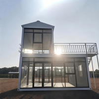 Cette maison conteneur empilable, type Tiny Home, offre une résistance élevée et une étanchéité robuste pour les scénarios extérieurs ou de bureau.