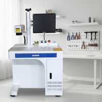 Machine de marquage laser à fibre 100W facile à utiliser, type split, refroidie par air, capable de découpe en relief et de marquage