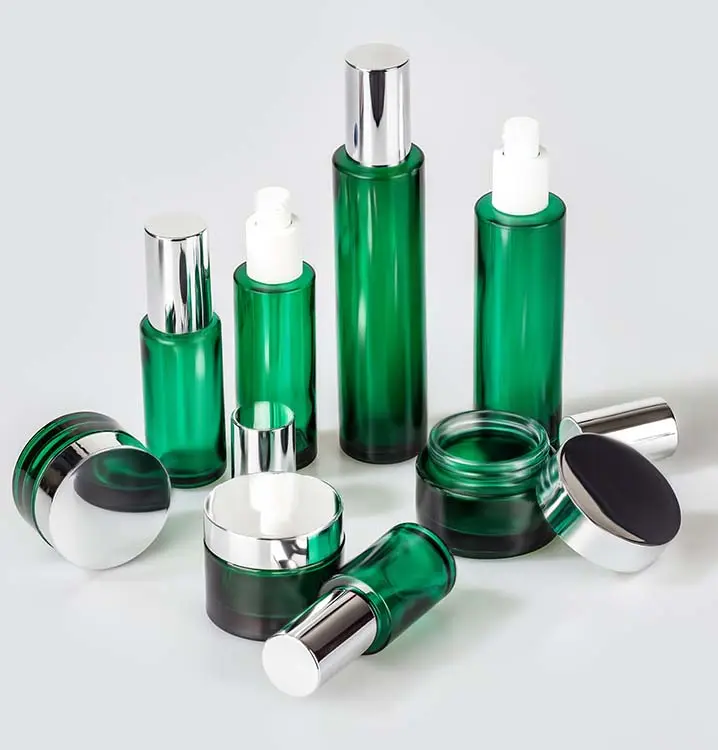 Empty luxury matte lotion spray pump bottles custom glass cream jars gloss green jars cosmetic glass jar bottle with screw lids