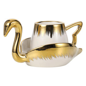 Ensemble tasse et soucoupe en céramique créative en forme de petit cygne électroplaqué, ensemble tasse à expresso et théière, ensemble de tasses à thé et à café pour la maison - Product Image 1