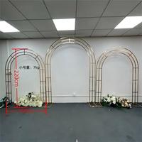 Arche de mariage élégante et luxueuse en fer doré électroplaqué, détachable, incurvée, support de toile de fond, conception modulaire, durable, pour événements et photographie