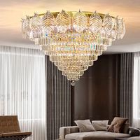 Lustre de plafond en or de luxe de haute qualité, lampe suspendue en verre en forme de feuille d'arbre de luxe pour salon, restaurant, lustre ovale en cristal