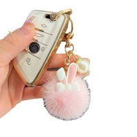 Porte-clés pelucheux en fausse fourrure avec oreilles de lapin et pompon pour femmes, accessoires de voiture, mini pompon