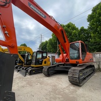 Excavadora de cadenas usada Doosan DX300LC 9C premium, con pocas horas de uso, en buen estado, pintura original completa, para proyectos de construcción