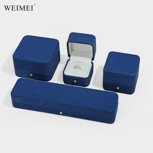 กล่องใส่เครื่องประดับหนังสีน้ำเงิน WEIMEI แบบมีเท็กซ์เจอร์ มุมโค้งมน ปิดด้วยกระดุมโลหะ สำหรับบรรจุแหวนและต่างหู - Product Image 1