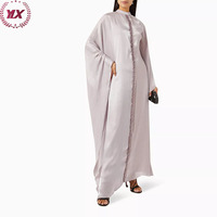 Baju Muslim Wanita Arab Model Cape Kerah Tinggi dengan Hiasan Manik-Manik dan Potongan Bawah Melengkung Desain Terbaru
