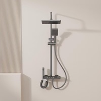 Ensemble de douche mural gris anthracite avec mitigeur de douche à effet pluie et robinetterie de douche