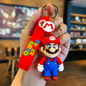 Venta al por mayor de alta calidad <span class=keywords><strong>Super</strong></span> Bros Mario dibujos animados Mario lindo burbuja dragón Mario muñeca coche encanto accesorios llaveros - Product Image 6