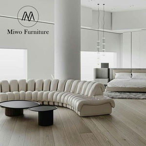 Canapé en cuir créatif de forme spéciale, design italien, arc serpentin, salon, hôtel, canapé modulaire central - Product Image 3