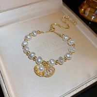 Bracelet en perles d'eau douce baroques, forme animale, style français, élégant et polyvalent, coquillage, haut de gamme, légèrement luxueux, pierre œil-de-chat