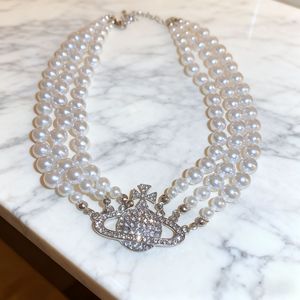 Saturn Multi Layered Pearl Necklace AAA Grade Silver Cross Star Pendant Choker For Women Everyday Wear - Product Image 1