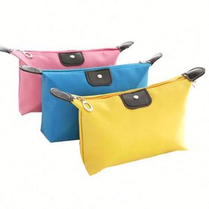 Promotion : Trousse de Toilette Pliable Imperméable Couleurs Bonbon Mignonne pour Filles avec Fermeture Éclair – Sac Cosmétique Pas Cher - Product Image 1