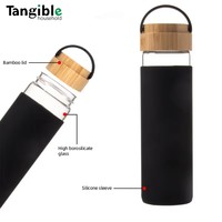 Bouteille d'eau en verre borosilicate de 550 ml avec couvercle en bambou, manchon en silicone et bouchon à vis – Écologique et résistante à l'eau bouillante, idéale pour les voyages