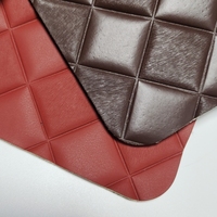 Pochette matelassée perforée avec broderie de grande surface perforée brodée de PVC Rexine éponge artificielle en cuir pour siège de voiture plancher de voiture
