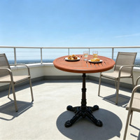 Table ronde d'extérieur en aluminium moulé, robuste, motif griffe de tigre, vente en gros d'usine, idéale pour les restaurants, les terrasses et autres espaces.