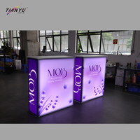 Stand d'exposition LED facile à installer, en aluminium, avec armoire de présentation pour salon professionnel, plateau en granit, emballage inclus, comptoir de réception moderne.