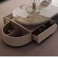 Table basse minimaliste arrondie en pierre frittée beige pour hôtel et maison