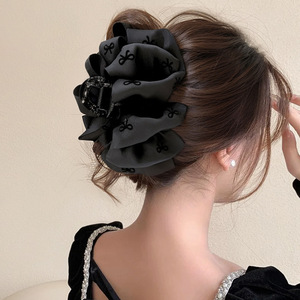 High-end black bubble <b>bow</b> hair <b>clip</b> for women with voluminous hair, perfect for updos. - Product Image 2