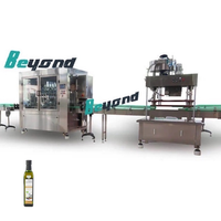 Machine de remplissage d'huile compacte automatique 500BPH 500ml-5L pour l'emballage d'huile comestible de tournesol d'olive