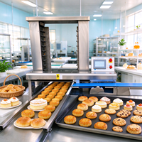 Machine automatique d'organisation de pâtisseries, biscuits et gâteaux sur plaques de cuisson et plateaux