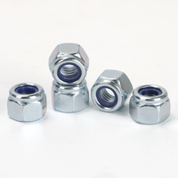 Écrou de blocage hexagonal épais en acier au carbone DIN 982 Grade 8 avec insert non métallique, zingué bleu-blanc, pour applications anti-vibrations