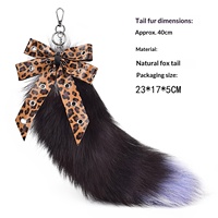 Promotion : Porte-clés queue de renard véritable 40 cm avec nœud imprimé léopard, breloque de sac en fourrure moelleuse, pendentif pour sac à dos