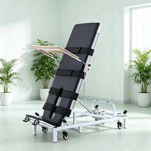 Soins infirmiers pour patients paralysés subissant une thérapie avec un lit d'électrokinésiologie inclinable, équipement de physiothérapie - Product Image 1