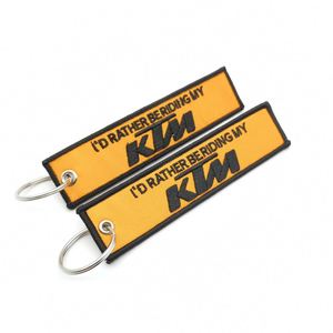 Llavero de Tela Bordado Personalizado de Doble Cara con Etiqueta Personalizada de Alta Calidad X926, con Texto o Logotipo - Product Image 3