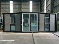 Maison conteneur pliable en acier Shinestone avec grandes fenêtres, idéale pour un logement temporaire ou un bureau de chantier