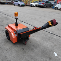 Tracteur électrique industriel à structure robuste pour applications de remorquage multi-remorques dans les parcs logistiques