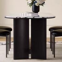 Table à manger ovale extensible de luxe italienne avec plateau en pierre et base en bois massif pour la maison, la villa, l'hôtel, la salle à manger