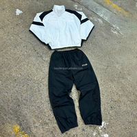 Survêtement en nylon personnalisé à faible MOQ avec vestes coupe-vent zippées patchwork et pantalons de jogging, vêtements de marque privée