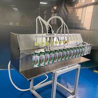 Fillinmachine 6 Têtes Semi Automatique 5000ml Standup Boisson Sac Liquide Détergent Jus Bébé Alimentaire Bec Poche Machine De Remplissage