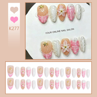 Lot de 30 faux ongles en acrylique, forme amande, rose français, avec fleurs 3D, étoiles de mer, coquillages et perles, kit complet pour pose à pression, vente en gros, pour nail art