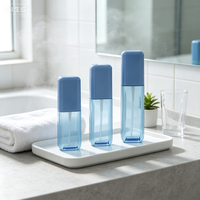 Nouveau produit en promotion : Flacon vaporisateur corporel en plastique bleu cylindrique de 100 ml, couleur personnalisée, finition mate, pour lotion pour les mains avec pompe.