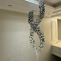 Lustre en verre et pierre irrégulière de style art moderne, suspension longue en spirale pour la décoration des escaliers de villa et des plafonds hauts