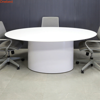 Table élévatrice pour moniteur d'ordinateur de petite taille de forme ovale Table de conférence à surface solide Corian de conception moderne pour six personnes