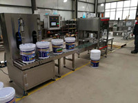 Machine de remplissage de peinture gravimétrique anglaise PLC Machine de remplissage de pesage de liquide visqueux pour revêtements industriels