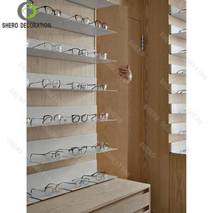ตู้โชว์ร้านแว่นตาขายส่ง ตู้โชว์แว่นตาแบบกำหนดเอง ชั้นวางแว่นตาพร้อมการออกแบบตกแต่งภายในร้านแว่นตา - Product Image 2
