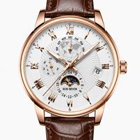 Montre de luxe pour homme à cadran en verre quartz, bracelet en cuir, boîtier en alliage, avec breloque lune ciel étoilé 20 mm et calendrier à trois aiguilles, livrée en coffret