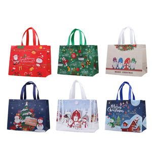 Không dệt giáng sinh dây rút gói quà tặng Túi phổ biến tùy chỉnh phim hoạt hình in tái chế nhà máy Bán Sỉ - Product Image 6
