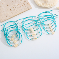 Lot de 12 bracelets perlés ajustables avec breloques tortue de mer, coquillage cauris et étoile de mer, cordon turquoise, bijoux océaniques, cadeau