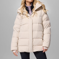 Veste d'hiver matelassée pour femme en tricot de haute qualité personnalisée avec rivets imperméables et rembourrage en polyester pour garder au chaud