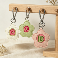 Breloque de sac en cuir en forme de fleur, broderie de lettres au point d'aiguille, auto-finie, ornement en cuir, cadeau