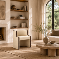 Fauteuil lounge moderne avec dossier incurvé enveloppant, fauteuil en tissu avec finition en bois pour coin lecture dans le salon