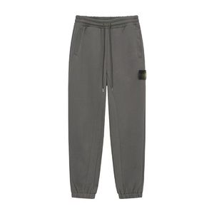 Nuevo estilo de pantalones casuales a la moda, pantalones deportivos Compass hasta el tobillo, pantalones deportivos versátiles, pantalones largos STONE para hombre y mujer - Product Image 5